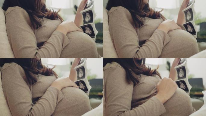 孕妇在看超声图像宝妈怀孕孕检B超期待新生