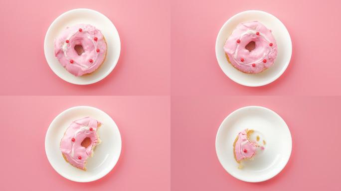 粉色背景上的甜甜圈