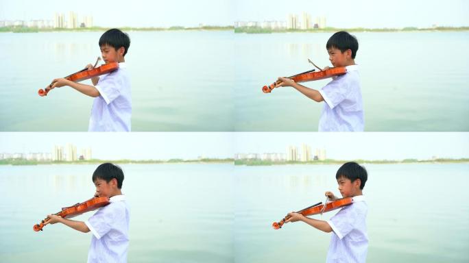 儿童 男童拉小提琴