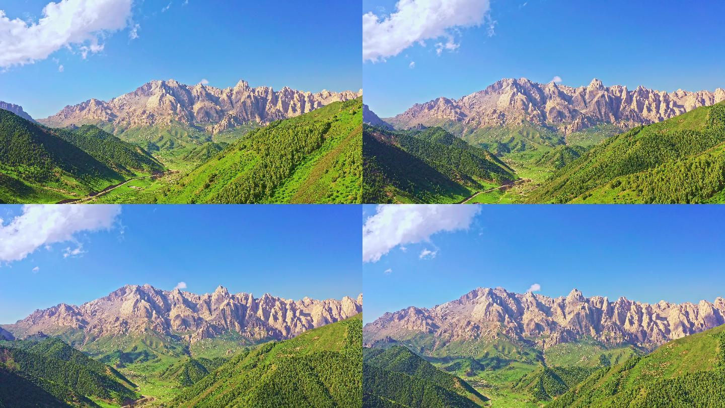 中国甘肃省青藏高原马牙雪山与草原蓝天航拍