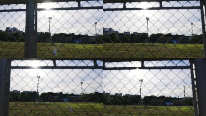 足球场荒芜的足球场运动场铁栅栏空旷球场
