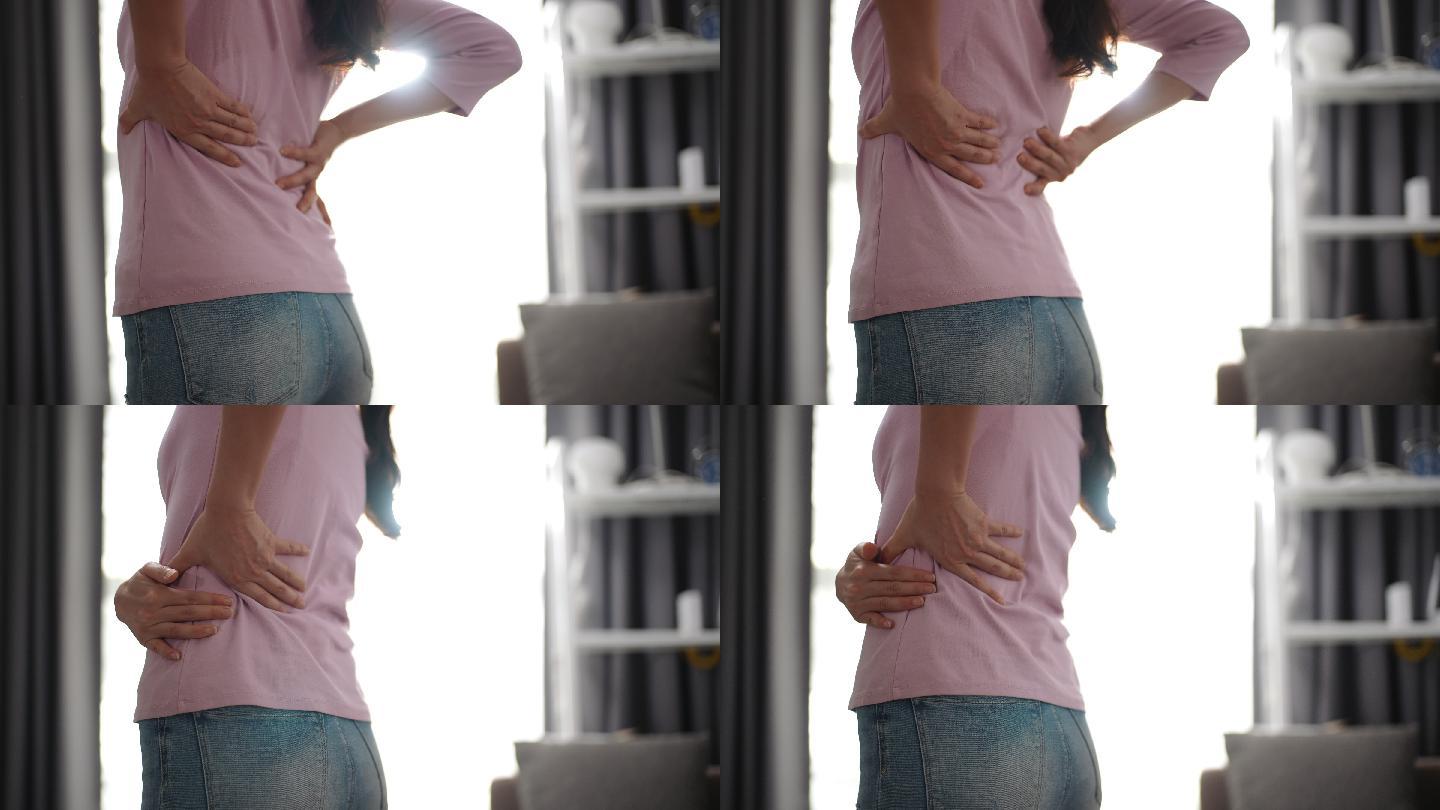 女性背痛腰酸背疼过度劳累妇女腰痛