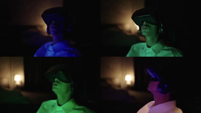 年轻人晚上使用虚拟现实耳机放松
