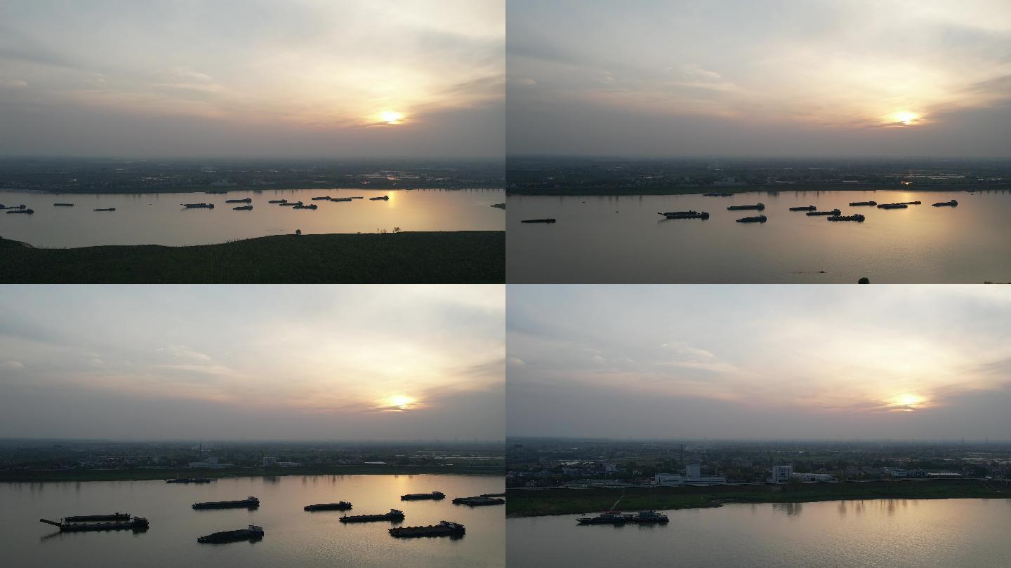 航拍捞刀河的夕阳落日和船舶剪影