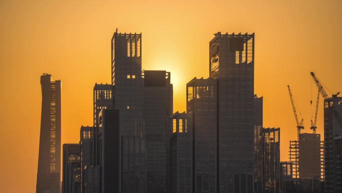 4K延时-太阳从建筑群中落下