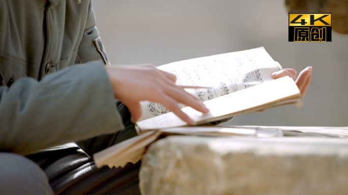 八路军谱曲创作乐谱交流窑洞内缝衣服