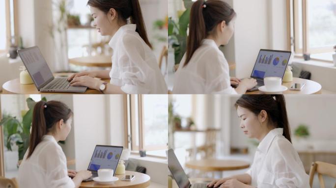 4K都市女白领咖啡馆用笔记本电脑移动办公