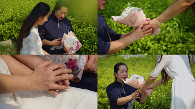 母亲节女孩给妈妈送花和妈妈拥抱孝顺感恩