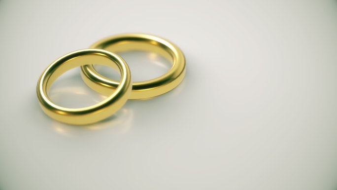 金色结婚戒指金戒指黄金对戒结婚礼空镜头空