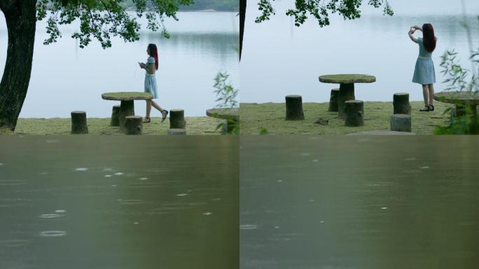 美女湖边游玩唯美空镜雨点掉落在湖面上