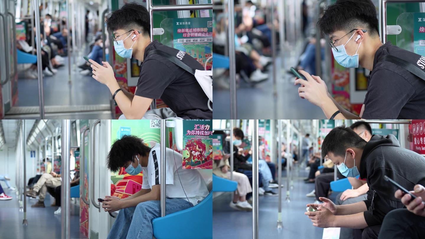 4K正版-公共交通上低头玩手机的年轻男性