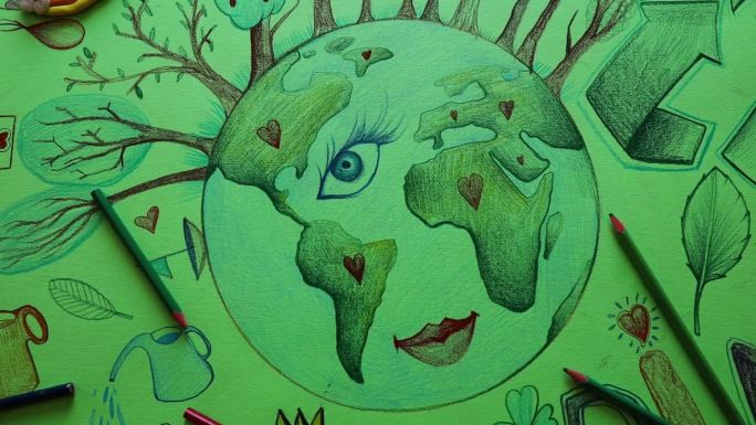 在绿纸上画地球的美丽图画
