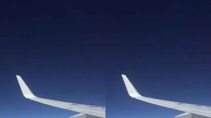从飞机窗口观看天空的云层