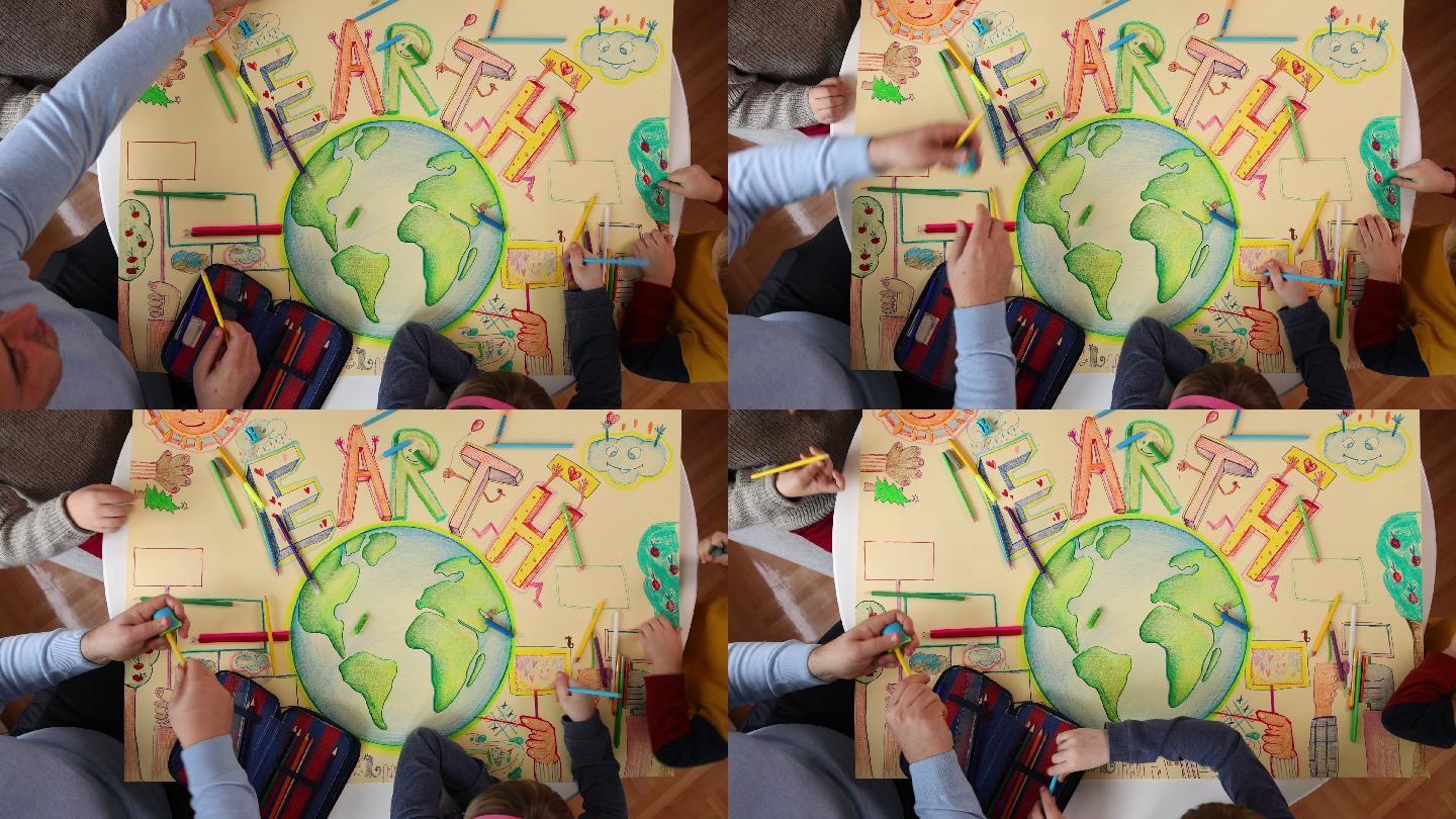 孩子们在一起画地球