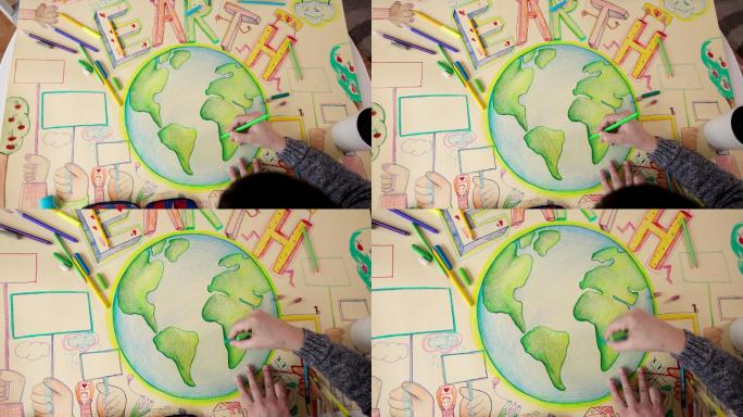 一个孩子在画地球绘画美术素描写生画画培训