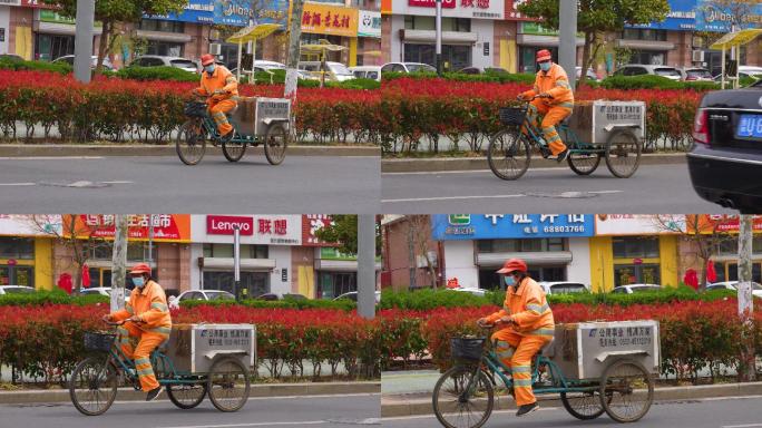 清洁工吃力蹬车，环卫工人蹬三轮