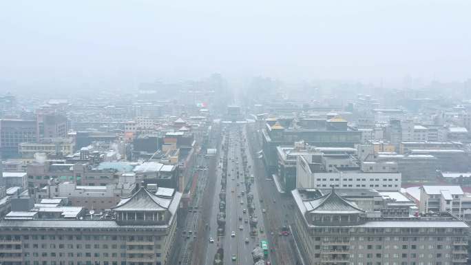 西安南门永宁门城墙钟楼雪景4K航拍近景