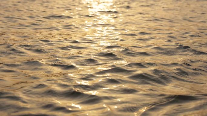 4k波光粼粼水面金色湖面黄昏江面
