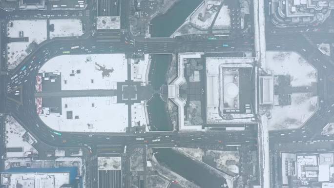 西安南门永宁门城墙钟楼雪景4K俯拍