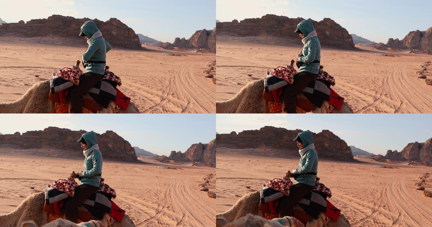 年轻的女旅行者炎热沙漠穿越