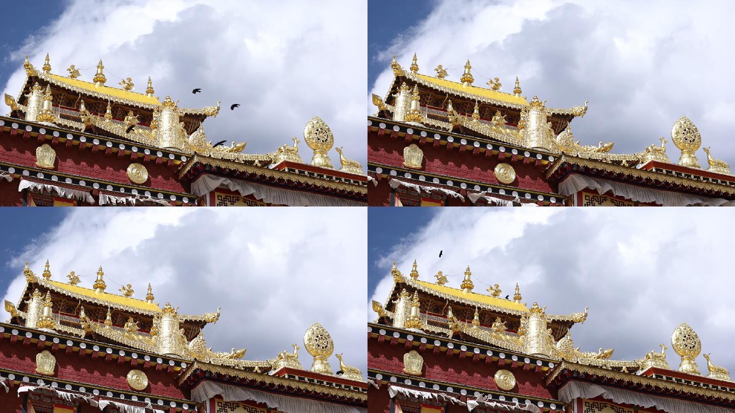 松赞林寺金色雕塑和飞过的乌鸦