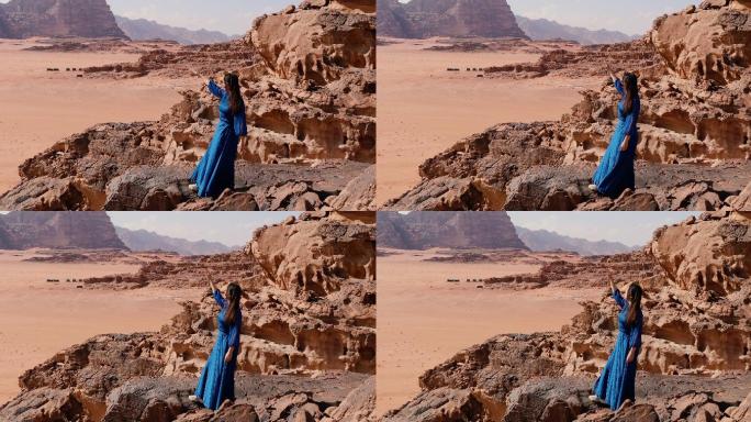 女旅行者在沙漠看风景