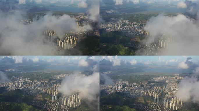 云雾中飞出出现华鸿小区及城关主要的高楼
