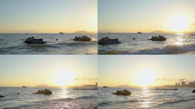 4K金色夕阳下海浪中的摩托艇