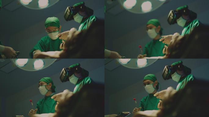 外科医生使用虚拟现实眼镜操作技术。