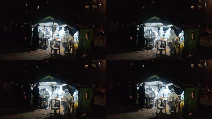 山东济南：深夜帐篷里灯光下的核酸检测