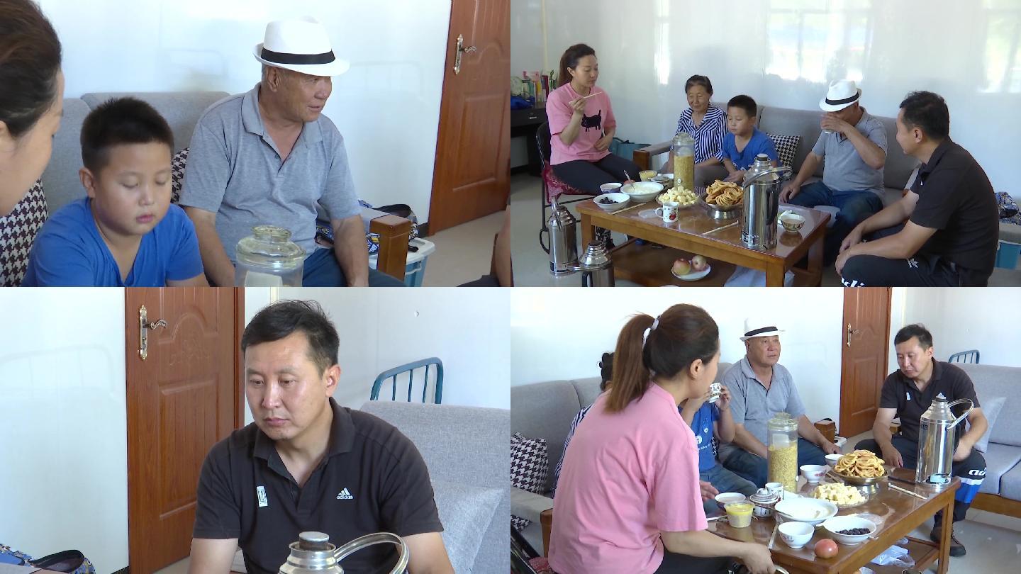 蒙古族一家人在一起喝奶茶吃奶酪幸福生活