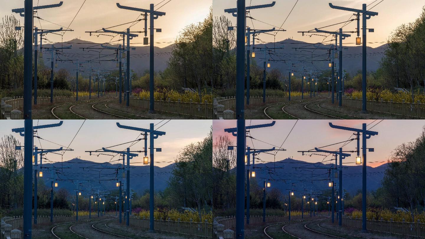 火车黄昏夕阳下穿过花丛森林日转夜延时摄影