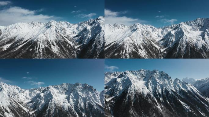 雪山视频青藏高原蓝天下雪山沟壑纵横山坡