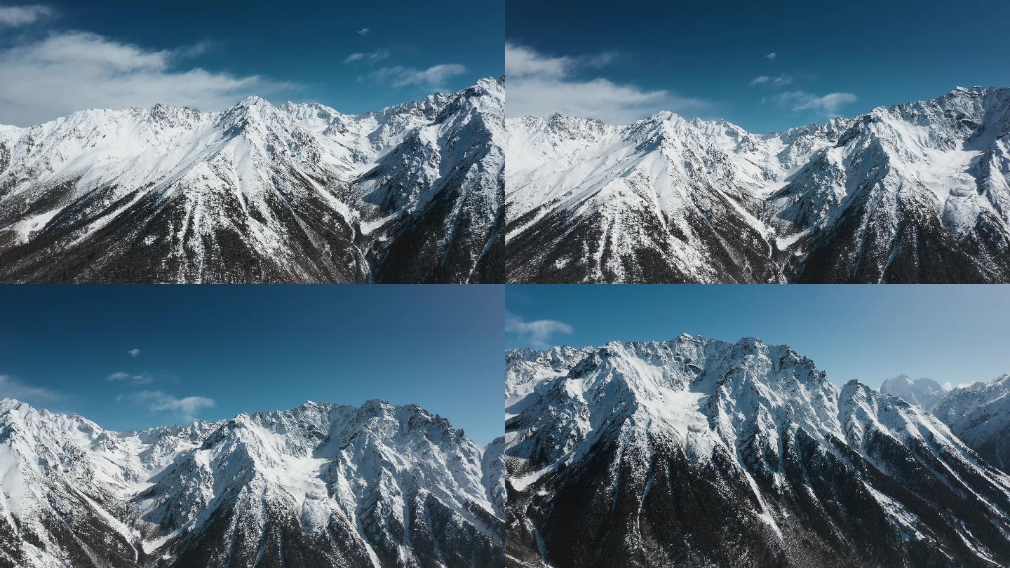 雪山视频青藏高原蓝天下雪山沟壑纵横山坡