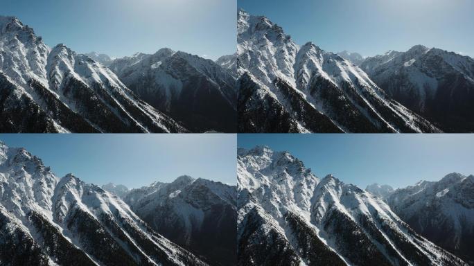 雪山近景视频青藏高原蓝天下雪山沟壑纵横