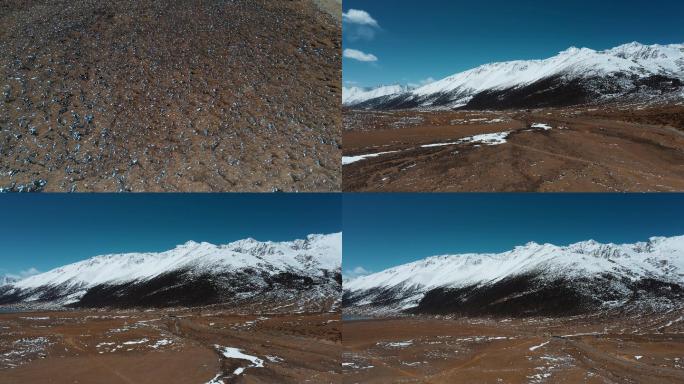 雪山草地视频青藏高原延绵的雪山峡谷平原