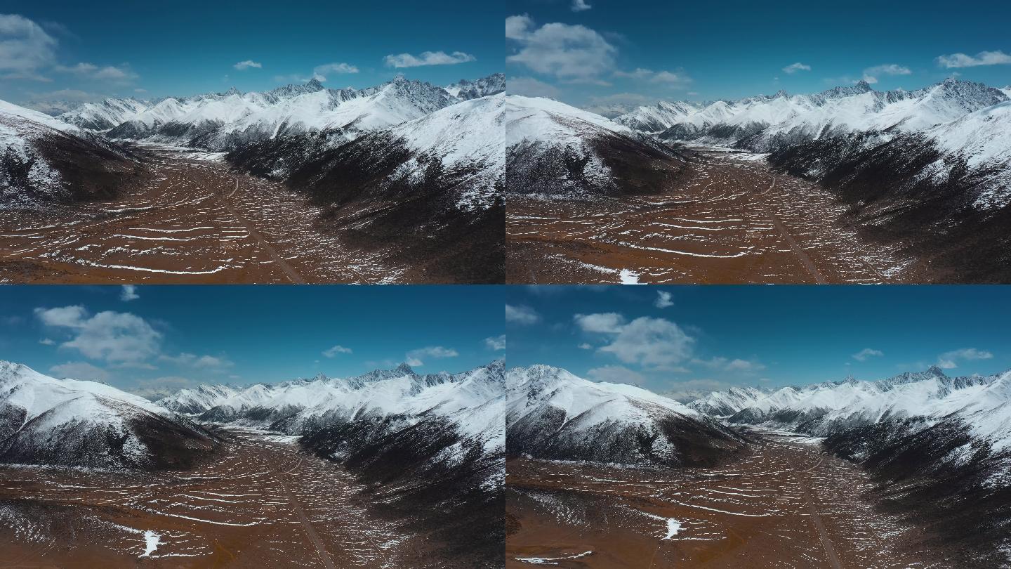 雪山峡谷视频青藏高原延绵的雪山和盆地