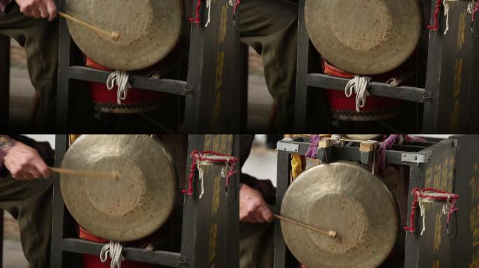 中国传统民间乐器锣敲打特写敲锣