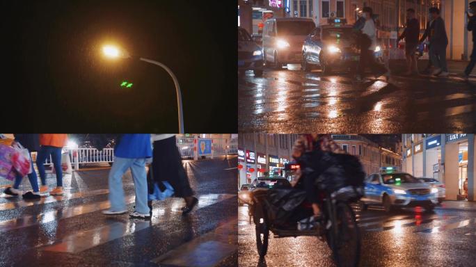 雨天夜景繁华街道路口人群
