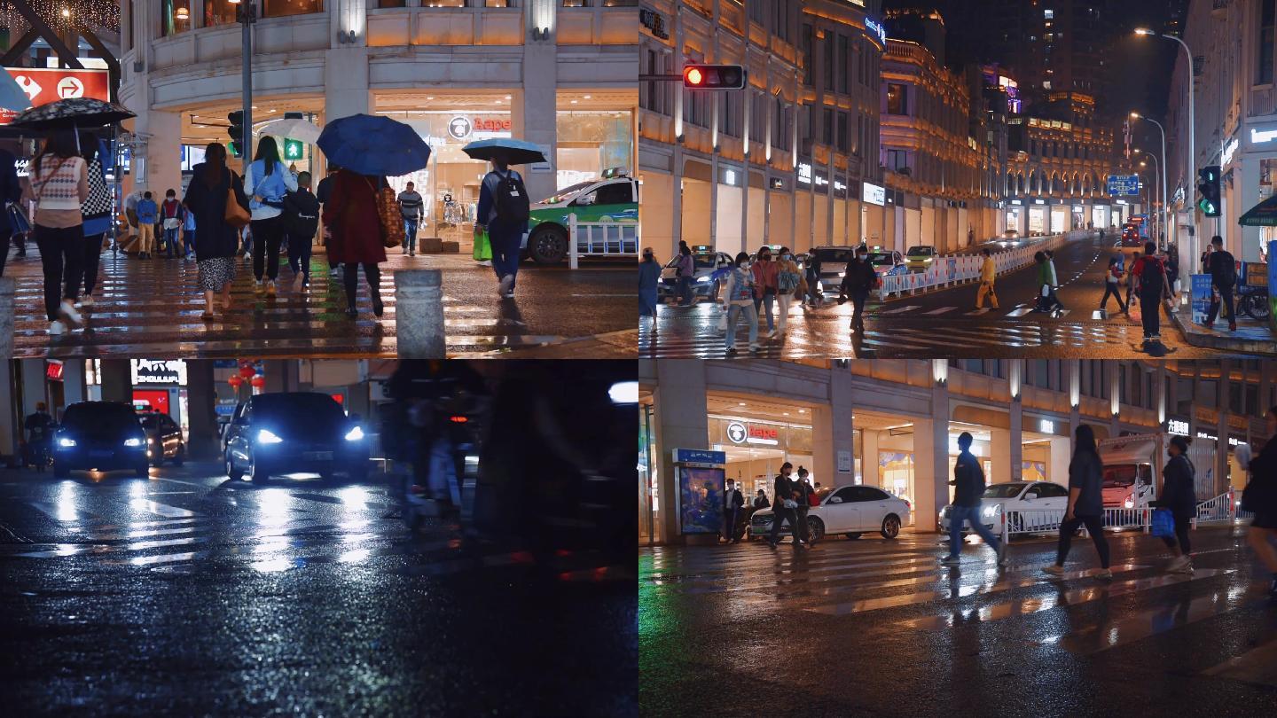 雨天路口人群城市繁华街道夜景