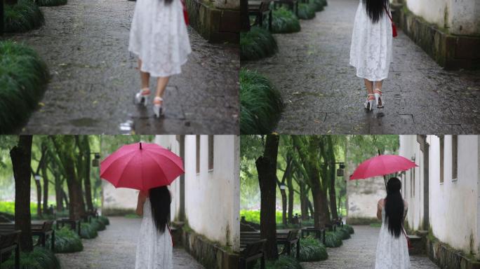 江南女孩白裙子红雨伞漫步青石板雨天背影