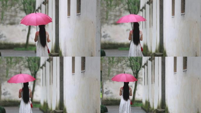 江南雨天古建筑青石板路白裙子女孩红雨伞