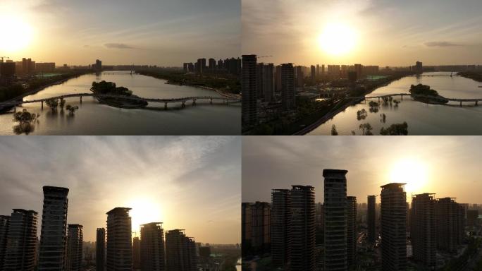 航拍夕阳下城市建筑快速发展大景