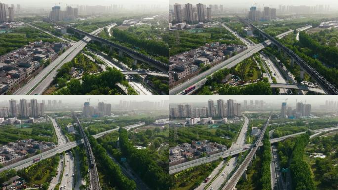 阳光下铁路与高速公路交叉口上的火车驶过