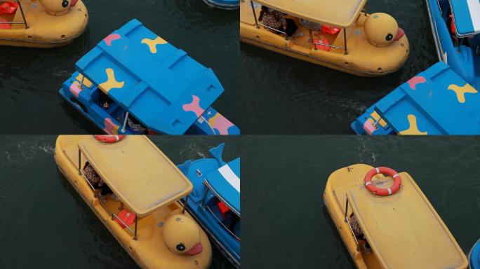 春季玉渊潭公园从桥上俯拍游人划船船游玩