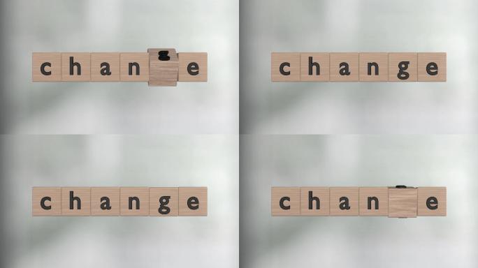 立方体上的字母构成单词Change和Chance。前面是散焦的背景。