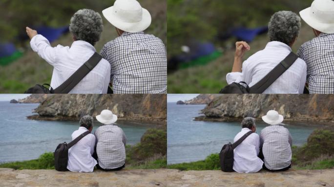 宣传片素材恩爱老夫妻坐在海边互相依靠