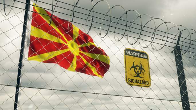 带有生物危害标志的马其顿国旗，警告隔离。循环的。