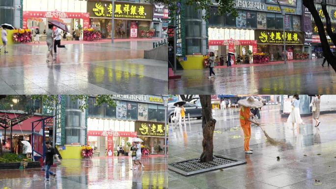 城市下雨打扫清洁打伞下雨