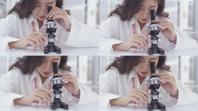 女性科学家正在研究疫苗和药物治疗疾病的研究测试中的反应。